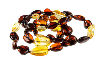 Amber jewelry on white background