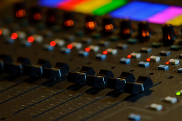 Fototapeta na wymiar Close up photo of audio mixer. Sound control panel at concert