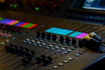 Fototapeta na wymiar Close up photo of audio mixer. Sound control panel at concert