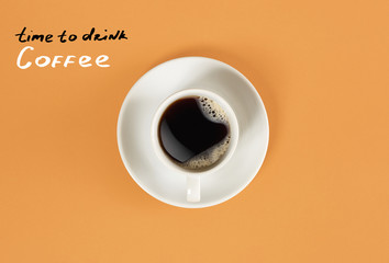 Top view of cup of black coffee and 