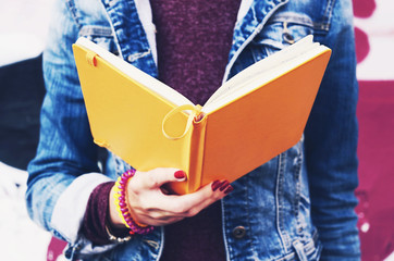 Fototapeta premium Student reading open copybook
