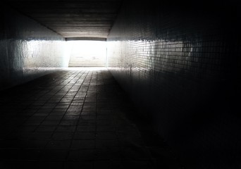 Dark undrespass with light at the end