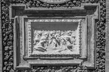 Ancient sculpture paintings on a fragment of the wall in the Villa Doria-Pamphili in Rome, Italy