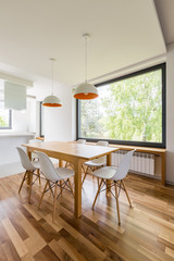 Interior with wooden dining table