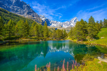 Fototapeta na wymiar View of the Blue lake (Lago Blu) near Breuil-Cervinia and Cervino Mount (Matterhorn) in Val D'Aosta,Italy