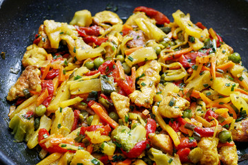 Thai dinner with chicken and vegetables.