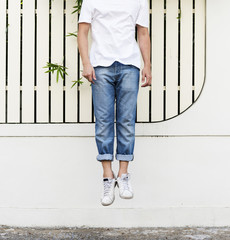 Man's body jumping midair