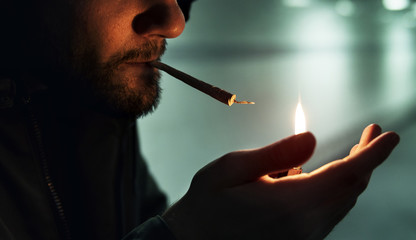 Fototapeta premium Homeless Man Smoking Cigarette Addiction