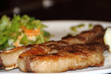 barbecue with traditional argentinian salad