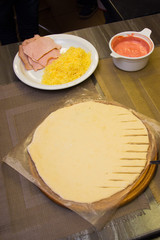 process of cooking pizza by children in the master class
