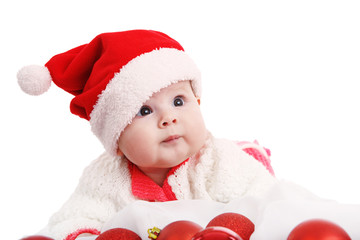Beautiful girl in Christmas costume with Christmas balls toys. In Studio on white background isolated