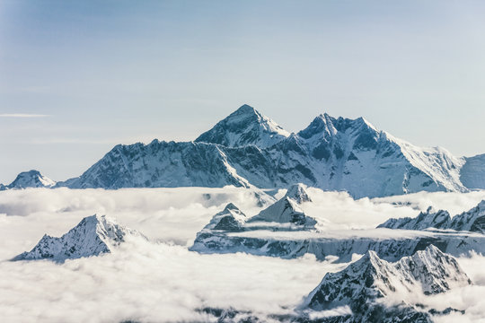 Mount Everest - Mountain peaks over clouds in Himalaya, Nepal