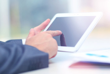 man holding digital tablet, closeup