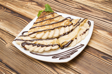 Crepes with bananas and cream