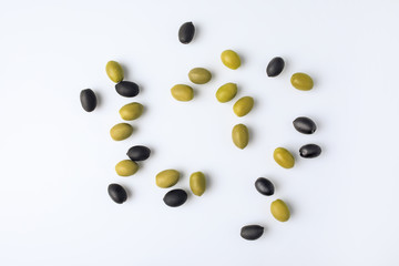 scattered green and black olives