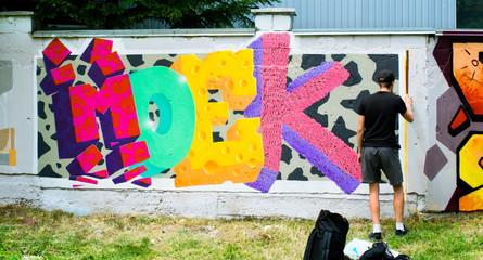 Graffiti on a fence.