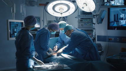 Medical Team Performing Surgical Operation in Modern Operating Room