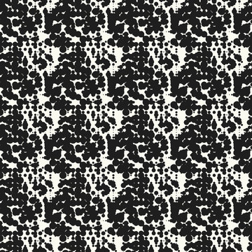 Seamless pattern halftone design. Modern textile print with dots. Vector fashion background. Grunge dirty circles. © Serge Zimniy