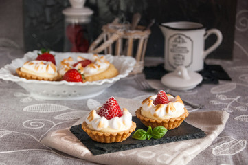 cakes with berries stacked in rows