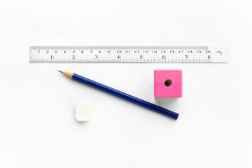 Stationery set includes pencil eraser ruler pencil sharpener on a white isolated background idea concept