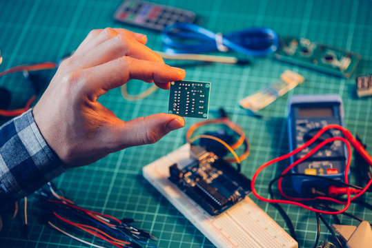 Man working with electrical components