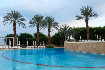 Fototapeta na wymiar Modern outdoor luxurious swimming pool
