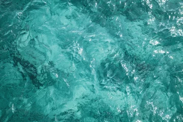 Fotobehang Turquoise Blauw oceaanwateroppervlak, achtergrondfoto