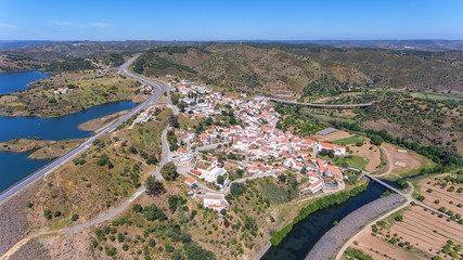 Obraz premium Aerial. Odeleyte village on a dam reservoir. Portugal