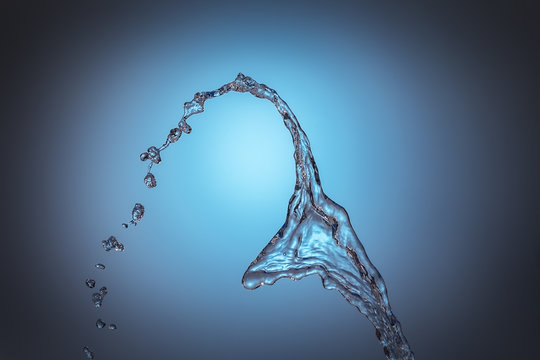 Splash Of A Stream Of Pure Water On A Blue Vignette Background.