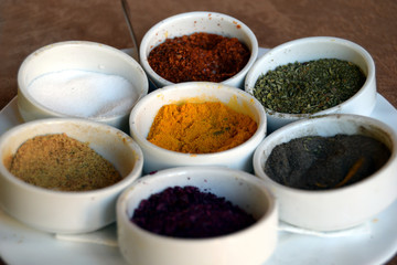 Different spices  on kitchen table