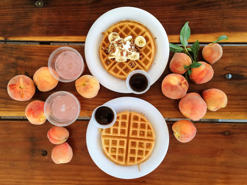table top view of waffles and peaches