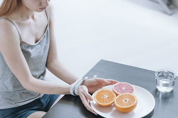 Girl keeping restricted diet