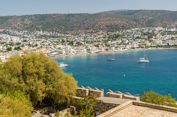 Fototapeta premium Sunny view of harbour from Castle of St. Peter, Bodrum, Mugla province, Turkey.