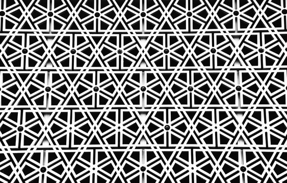 Detail of a mosque wall; decorative geometric pattern inspired by Islam related symbols
