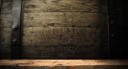 Wooden deck table on green grunge background