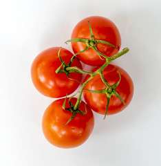 Natural tomatoes isolated on background