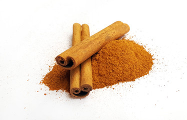 Cinnamon sticks on white background