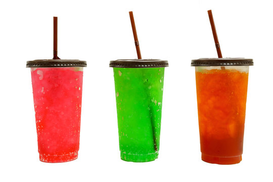 iced red soda, green soda and lemon tea in transparent plastic glass with brown lid and straw. isolated on white background with clipping path.