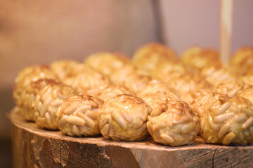 Some typical Spanish pastry "panellets" in Catalonia at All Saint's Day. Empty copy space for Editor's content.