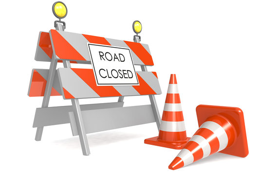 Road closed sign with traffic cones