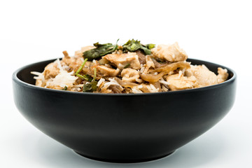 Homemade Chinese fried rice with vegetables and fried eggs