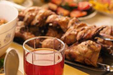 Glass cup with a drink on the served table / Photographed in Russia