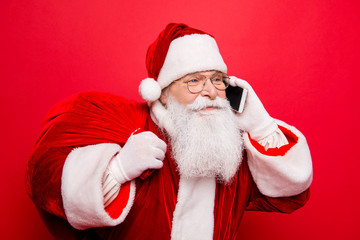Holly jolly x mas! Funny santa in headwear, costume, black belt, white gloves brings gifts for kids, ready, prepared to celebrate, sale promotion, winter december, chatting on telephone