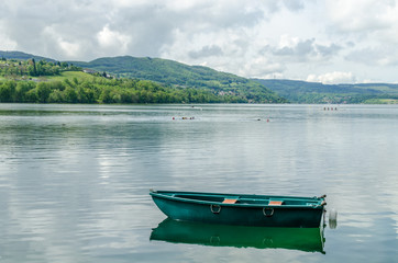 the green small boat