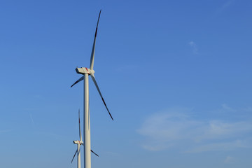 Production of alternative energy, solar panels and wind generators,in summer