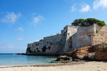 Fototapeta na wymiar Old fortress along Apulian coastline. Monopoli, Italy.