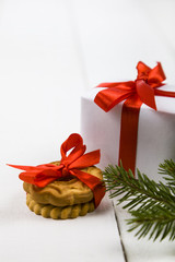 Christmas cookies and a box with a red bow.