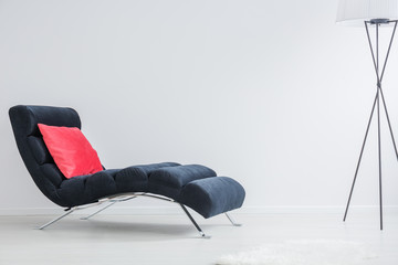 Pink cushion on couch