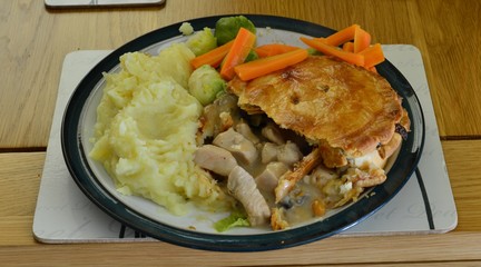English dinner of Chicken Pie, Mash Potato and Veg.
