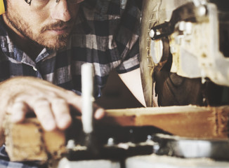 Artisan working with wood